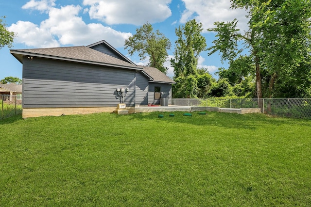 16731 Water Oak Dr, Channelview, TX 77530 - rear view of house with a shingled roof