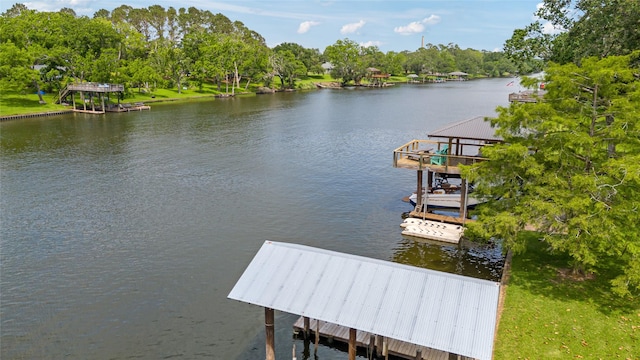 287 County Road 416, Brazoria, TX 77422 - dock with a water view and view of scattered trees