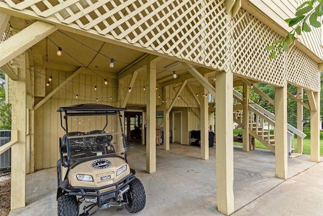 287 County Road 416, Brazoria, TX 77422 - view of patio with a carport, stairway, and central air condition unit