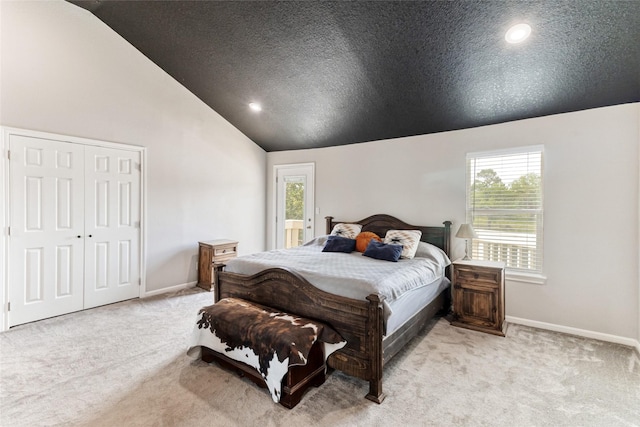 287 County Road 416, Brazoria, TX 77422 - bedroom with carpet floors, baseboards, lofted ceiling, multiple windows, and recessed lighting