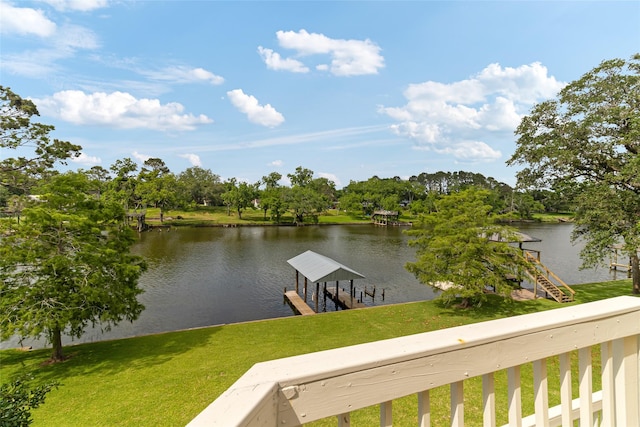 287 County Road 416, Brazoria, TX 77422 - dock with a water view, view of wooded area, and a yard