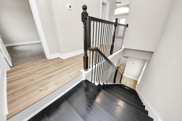 3913 Griggs Rd, Houston, TX 77021 - staircase featuring wood finished floors and baseboards