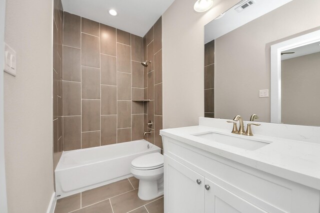 3913 Griggs Rd, Houston, TX 77021 - bathroom with vanity, toilet, tile patterned floors, shower / bathtub combination, and recessed lighting