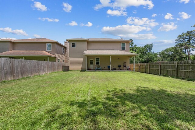 9307 Seeker St, Houston, TX 77028 - rear view of property with a patio area