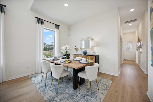 16800 Needlepoint Dr, Conroe, TX 77302 - dining room with light wood-style flooring, baseboards, and recessed lighting