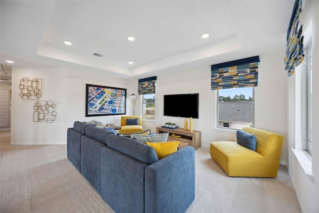 16800 Needlepoint Dr, Conroe, TX 77302 - living area with light colored carpet, recessed lighting, a raised ceiling, and healthy amount of natural light