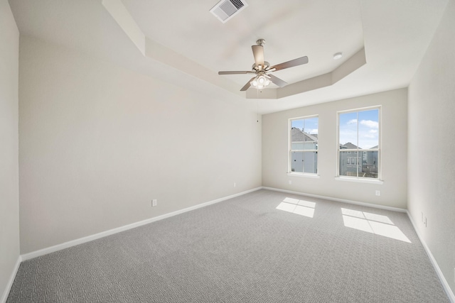 2033 Millbridge Spring Ln, Houston, TX 77051 - unfurnished room with a raised ceiling, carpet floors, baseboards, and ceiling fan