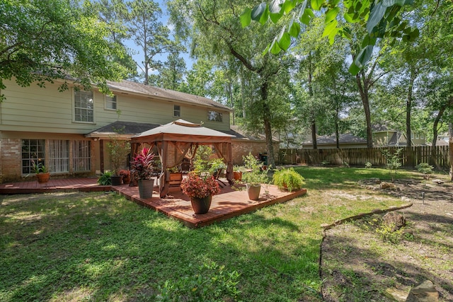 2828 S Logrun Cir, The Woodlands, TX 77380 - view of yard featuring a gazebo and a wooden deck