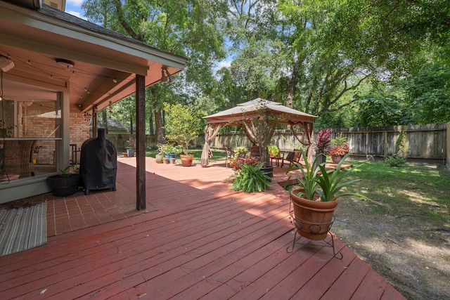 2828 S Logrun Cir, The Woodlands, TX 77380 - deck featuring a gazebo, a fenced backyard, and grilling area