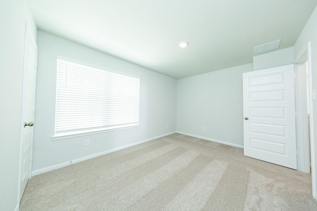 13228 Musky Dr, Conroe, TX 77384 - empty room with carpet and recessed lighting