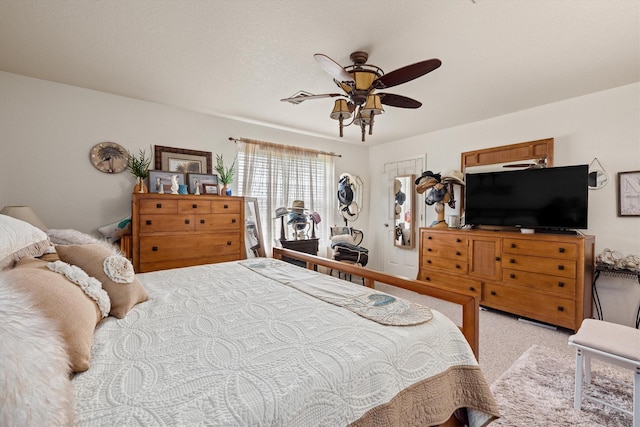 986 Tuna Dr, Crystal Beach, TX 77650 - carpeted bedroom with ceiling fan