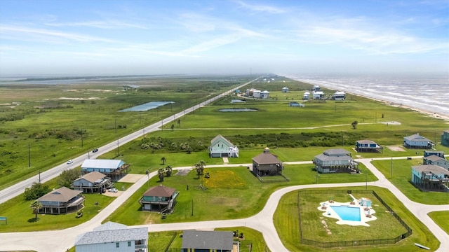 986 Tuna Dr, Crystal Beach, TX 77650 - bird's eye view of a large body of water and a pool area