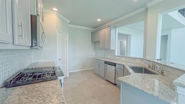 14227 Angelina Dr, Baytown, TX 77523 - kitchen featuring appliances with stainless steel finishes, a sink, tasteful backsplash, light stone counters, and ornamental molding