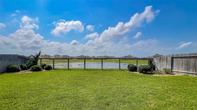 14227 Angelina Dr, Baytown, TX 77523 - view of yard featuring a water view and a residential view