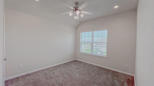 14227 Angelina Dr, Baytown, TX 77523 - carpeted spare room featuring vaulted ceiling, a ceiling fan, baseboards, and recessed lighting