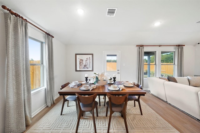 11608 Whirlaway Dr, Willis, TX 77318 - dining space featuring light wood-type flooring, baseboards, and recessed lighting