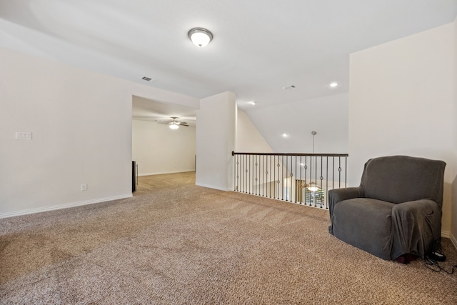 19823 Sonterra Ln, Richmond, TX 77407 - living area with ceiling fan, light carpet, vaulted ceiling, baseboards, and recessed lighting