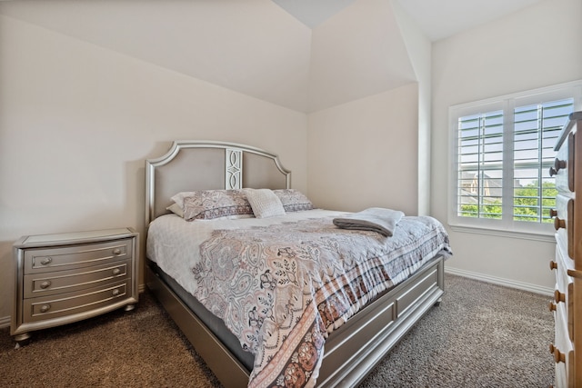 19823 Sonterra Ln, Richmond, TX 77407 - bedroom featuring dark colored carpet, baseboards, and lofted ceiling
