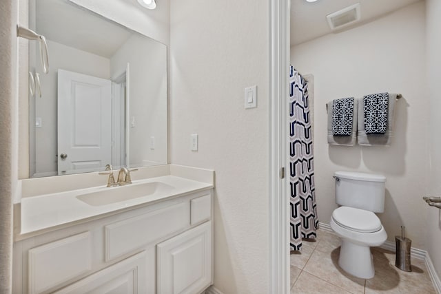 19823 Sonterra Ln, Richmond, TX 77407 - full bath with toilet, vanity, tile patterned floors, baseboards, and a shower with curtain