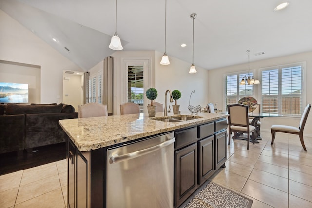 19823 Sonterra Ln, Richmond, TX 77407 - kitchen with stainless steel dishwasher, a sink, light tile patterned floors, vaulted ceiling, and a chandelier