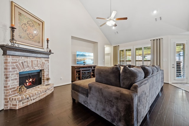 19823 Sonterra Ln, Richmond, TX 77407 - living area with high vaulted ceiling, dark wood finished floors, ceiling fan, a brick fireplace, and baseboards