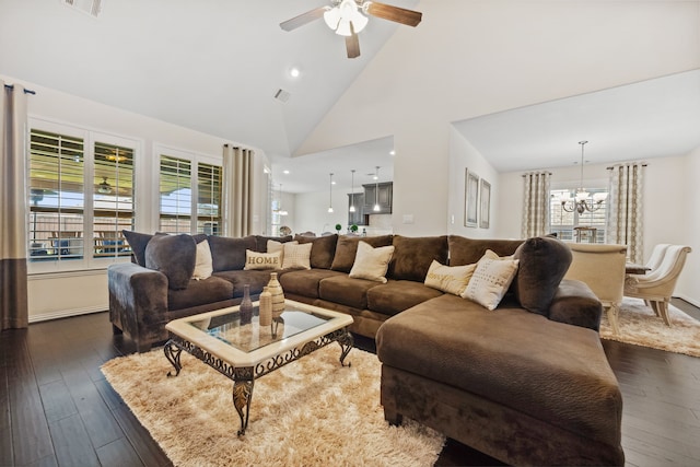 19823 Sonterra Ln, Richmond, TX 77407 - living room with a chandelier, dark wood finished floors, ceiling fan, plenty of natural light, and high vaulted ceiling