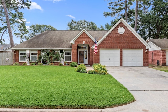 17322 Camberwell Green Ln, Houston, TX 77070 - view of front of home featuring brick siding, concrete driveway, an attached garage, and roof with shingles