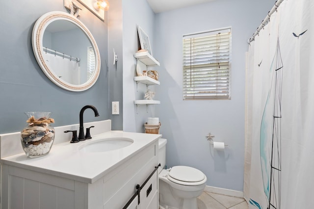 17322 Camberwell Green Ln, Houston, TX 77070 - bathroom featuring vanity, toilet, tile patterned flooring, and baseboards