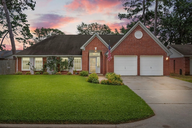 17322 Camberwell Green Ln, Houston, TX 77070 - traditional-style home with brick siding, driveway, a garage, and roof with shingles