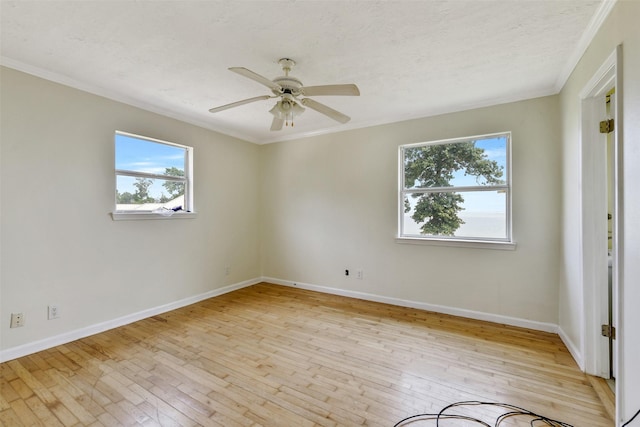 245 Bridgewater, Onalaska, TX 77360 - empty room featuring light wood-style flooring, crown molding, a ceiling fan, and baseboards