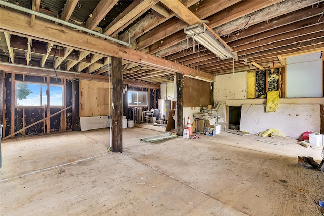 245 Bridgewater, Onalaska, TX 77360 - below grade area featuring gas water heater