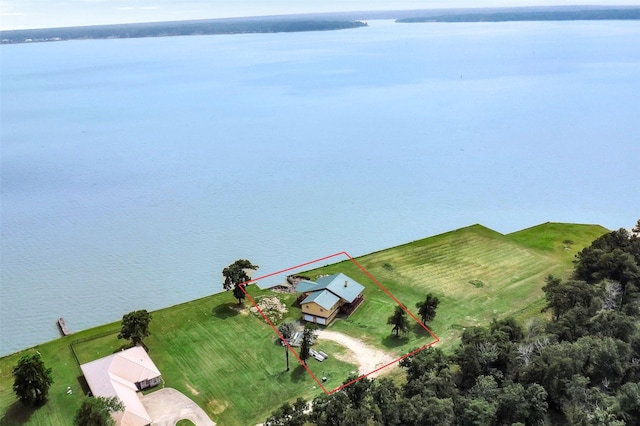 245 Bridgewater, Onalaska, TX 77360 - aerial view of property and surrounding area with a nearby body of water and property parcel outlined