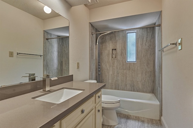 52 S Havenridge Dr, The Woodlands, TX 77381 - bathroom featuring wood finished floors, vanity, toilet, and  shower combination