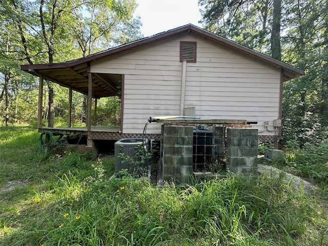 1883 Winding Creek Dr, Trinity, TX 75862 - view of home's exterior featuring central air condition unit