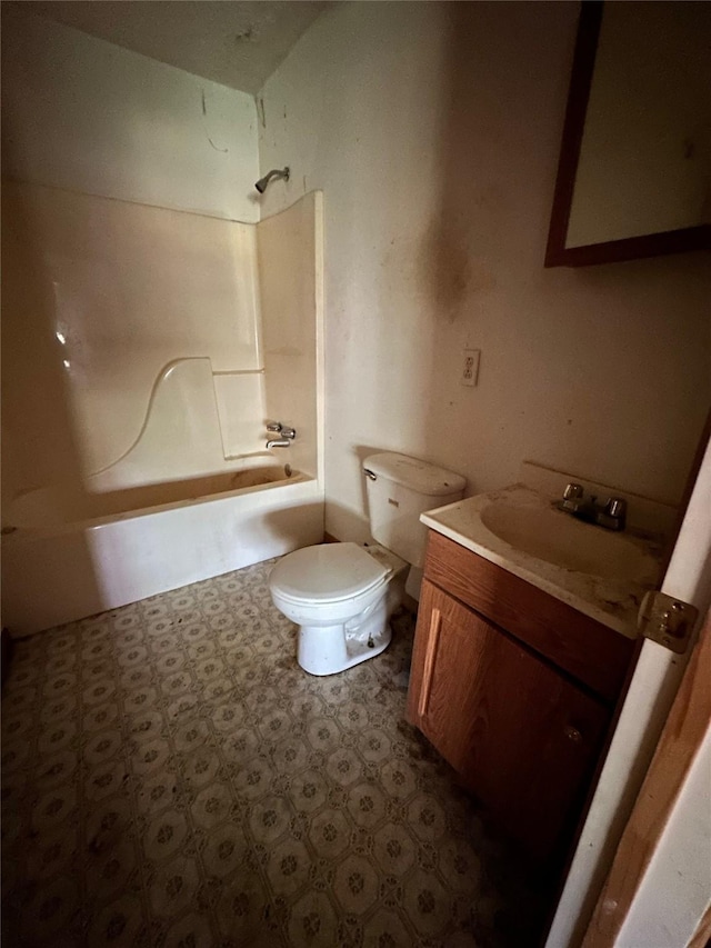 1883 Winding Creek Dr, Trinity, TX 75862 - full bath with toilet, vanity, tile patterned floors, and washtub / shower combination