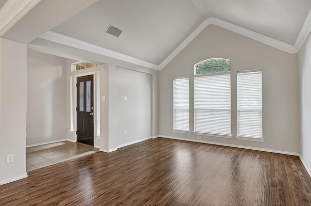 9927 Barr Lake Dr, Houston, TX 77095 - empty room featuring wood finished floors, lofted ceiling, baseboards, and ornamental molding