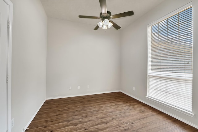 9927 Barr Lake Dr, Houston, TX 77095 - empty room with wood finished floors, a ceiling fan, and baseboards
