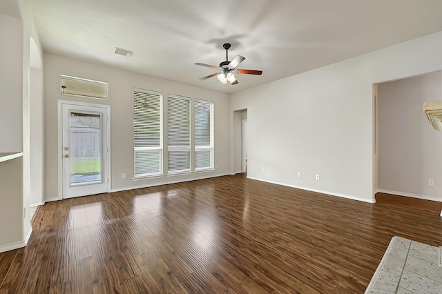 9927 Barr Lake Dr, Houston, TX 77095 - unfurnished living room featuring a ceiling fan, wood finished floors, and baseboards