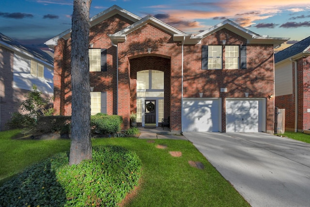 10138 Bayou Manor Ln, Houston, TX 77064 - traditional home featuring driveway, brick siding, and a garage