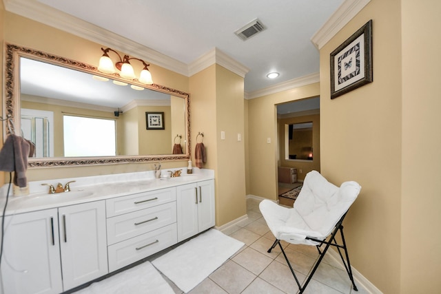 10138 Bayou Manor Ln, Houston, TX 77064 - full bath with double vanity, crown molding, tile patterned floors, and baseboards