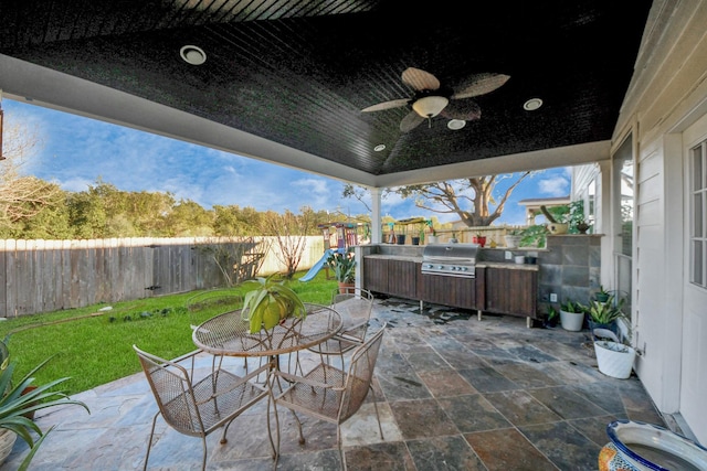 10138 Bayou Manor Ln, Houston, TX 77064 - view of patio / terrace featuring a playground, outdoor dining area, and ceiling fan