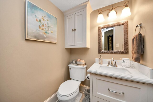 10138 Bayou Manor Ln, Houston, TX 77064 - bathroom with vanity, baseboards, and toilet