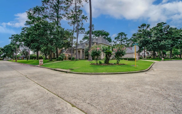 5810 Springton Ln, Spring, TX 77379 - view of front facade with a front lawn