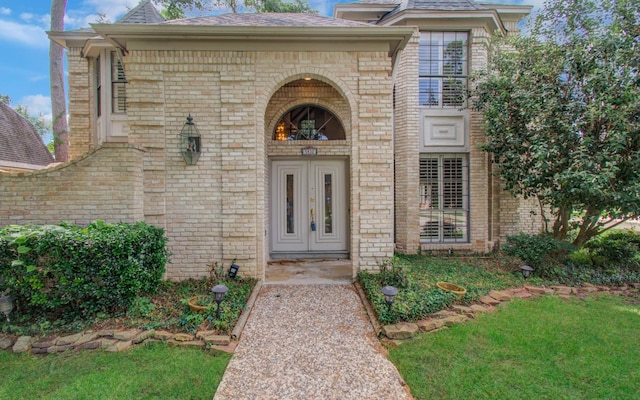 5810 Springton Ln, Spring, TX 77379 - doorway to property with brick siding and roof with shingles