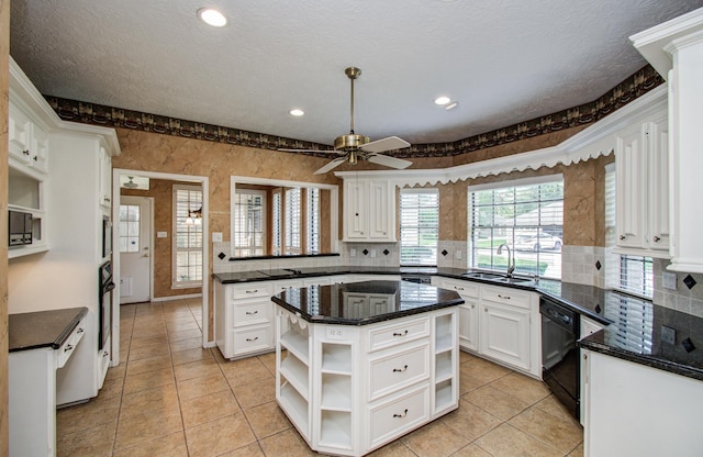 5810 Springton Ln, Spring, TX 77379 - kitchen featuring open shelves, a sink, black appliances, white cabinetry, and backsplash