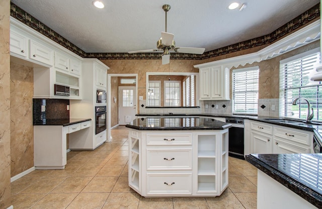 5810 Springton Ln, Spring, TX 77379 - kitchen featuring open shelves, oven, a sink, white cabinetry, and recessed lighting