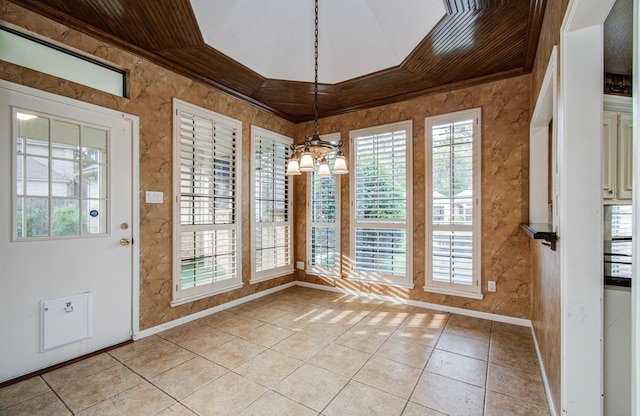 5810 Springton Ln, Spring, TX 77379 - unfurnished dining area featuring a chandelier, baseboards, light tile patterned floors, plenty of natural light, and crown molding