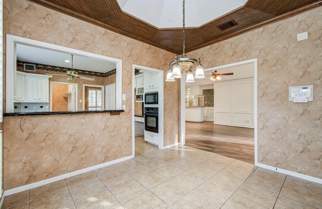 5810 Springton Ln, Spring, TX 77379 - kitchen featuring ceiling fan, crown molding, black appliances, and light tile patterned floors