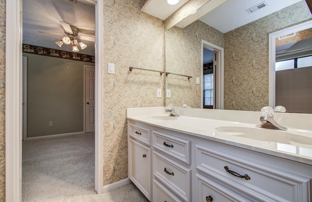 5810 Springton Ln, Spring, TX 77379 - bathroom featuring double vanity and baseboards