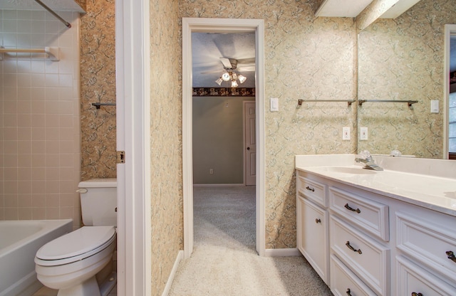5810 Springton Ln, Spring, TX 77379 - full bathroom with vanity, toilet, washtub / shower combination, and baseboards